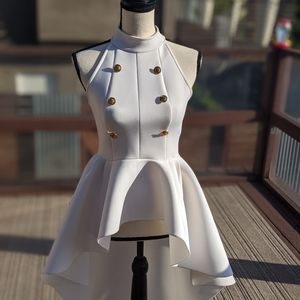 White dramatic top, small